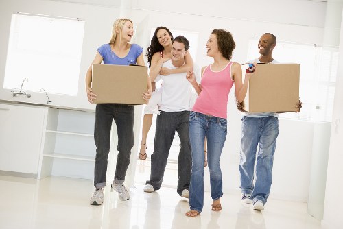 Professional packers at Storage Barnes handling boxes