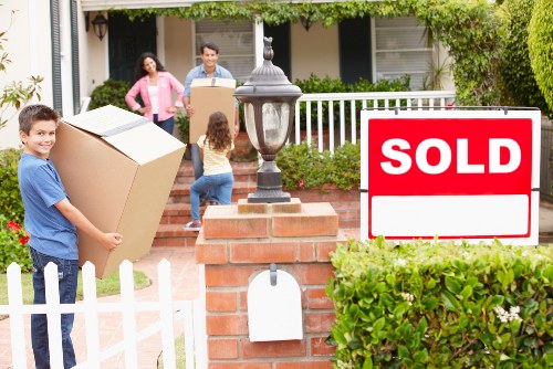 Professional movers assisting with loading items